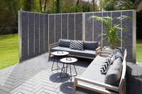 Gabionenzaun aus Steinen als Abgrenzung und Wind Lärm und Sichtschutz für die Terrasse maßgefertigte Ausführung im schmalen Design
