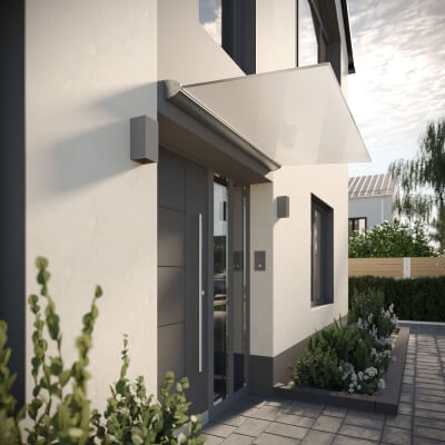 Freitragende Überdachung aus Glas mit Weißglas und Satinierung an grauer Hausfassade